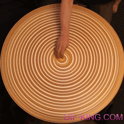 Hypnotic Patterns Drawn on Spinning Potter's Wheel