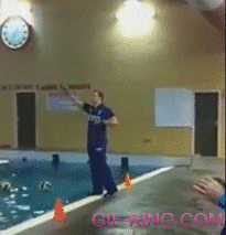 Swimming Coach Falls Into Water