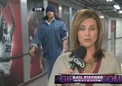 Joakim Noah dances behind a reporter