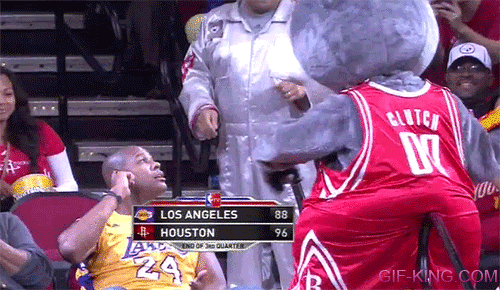 Rockets mascot throws cake at Lakers fan's face
