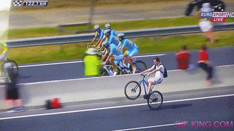 Man Rides Wheelie Alongside Tour De France