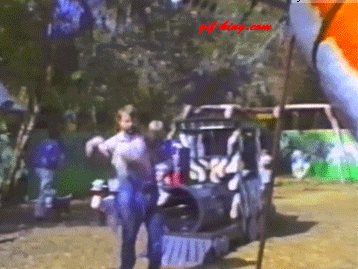 Dad_catches_kid_flying_off_swing