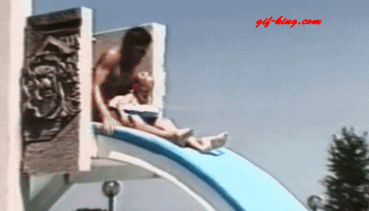 dad_tosses_kid_in_swimming_pool_on_slide_ride