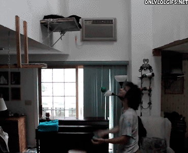 Cat Helps Guy Juggle