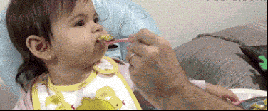 Baby starts eating with kit kat