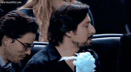 Yankees fan eating cotton candy in reverse