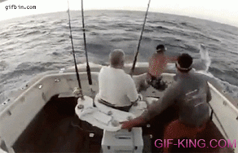 man jumps off boat after marlin jumps in