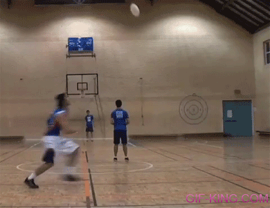 Frisbee Jump Throw Into Basketball Hoop