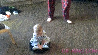Baby Riding Roomba