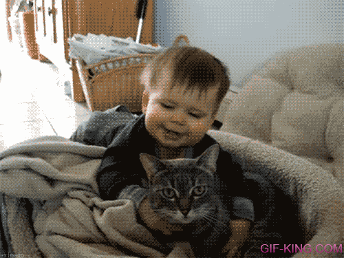 Baby Hugging His Friend Cat