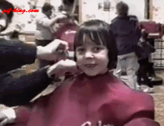 kid_getting_haircut_sees_self_in_mirror