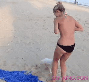 Cute Puppy Trying To Pull Off Girl’s Bikini Top