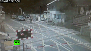 woman at level crossing near-miss