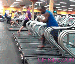 man dancing on the treadmill at the gym