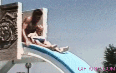 Dad Tosses Son In Swimming Pool On Slide Ride